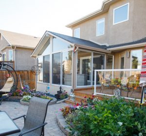 Look how this sunroom transforms this backyard